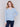 Frost blue long-sleeve sweater with front knot detail and V-neckline by Charlie B.