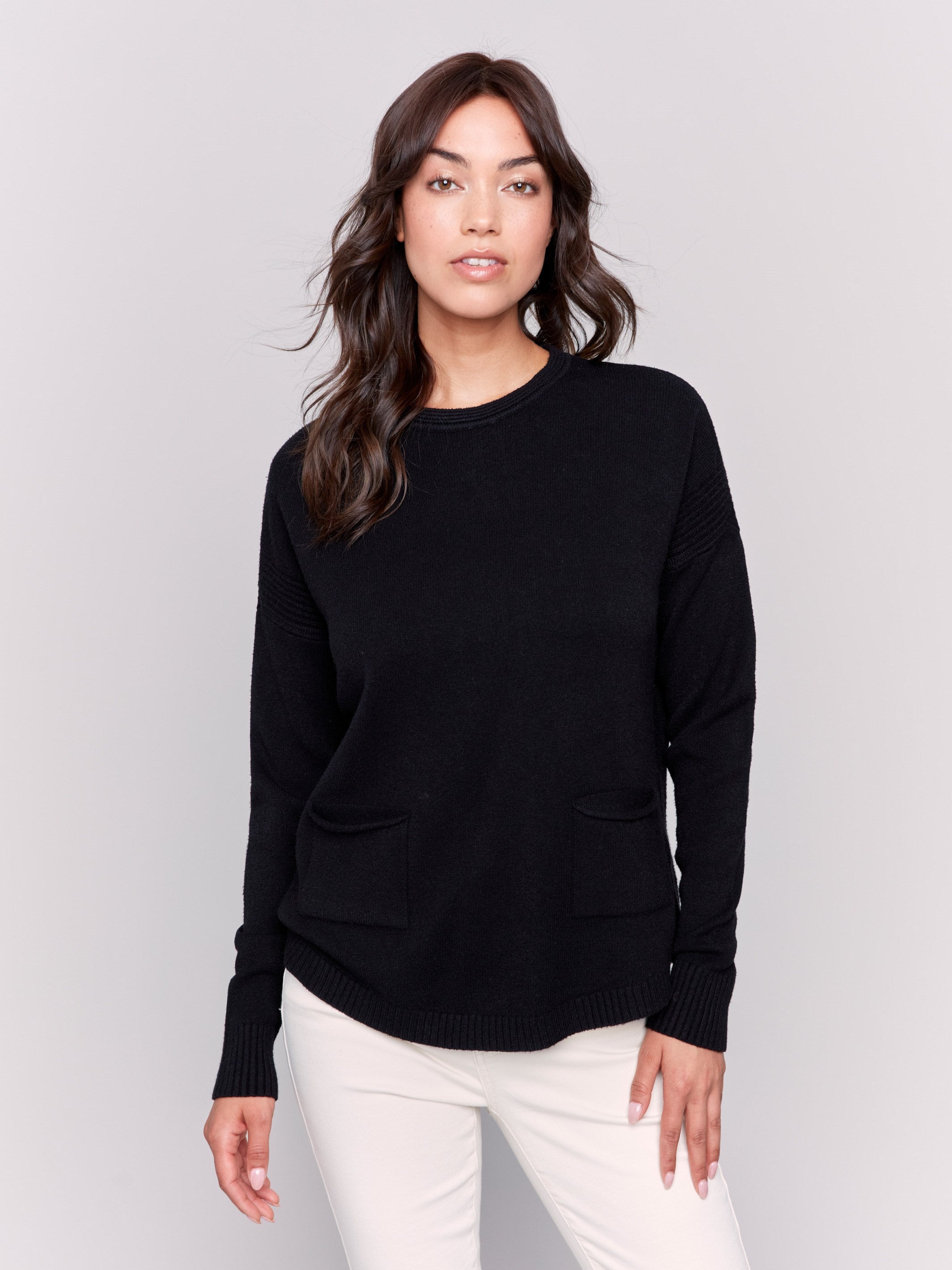 Black round hem sweater with a removable scarf and front pockets by Charlie B.