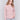 Woodrose pink sweater with long sleeves featuring side tab details and a round hem by Charlie B.