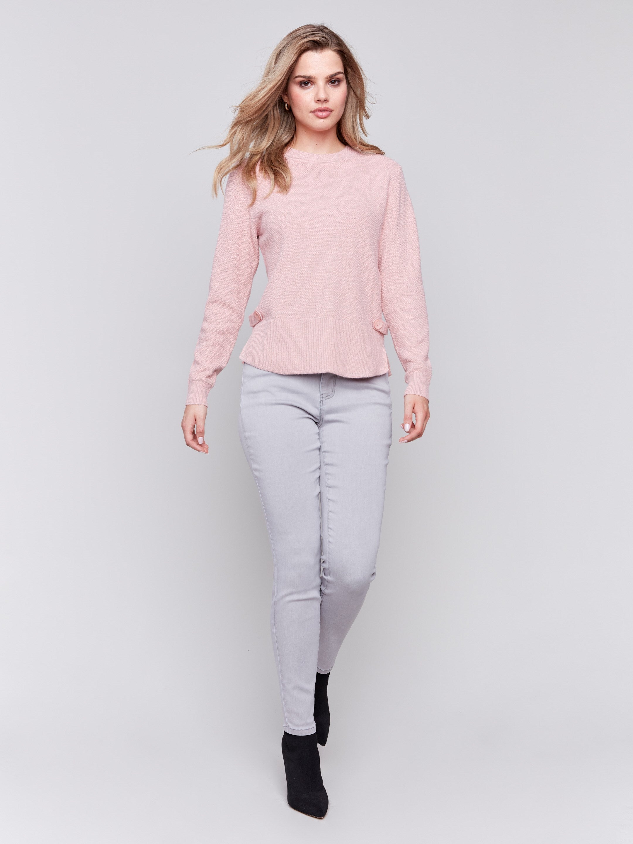 Woodrose pink sweater with long sleeves featuring side tab details and a round hem by Charlie B.