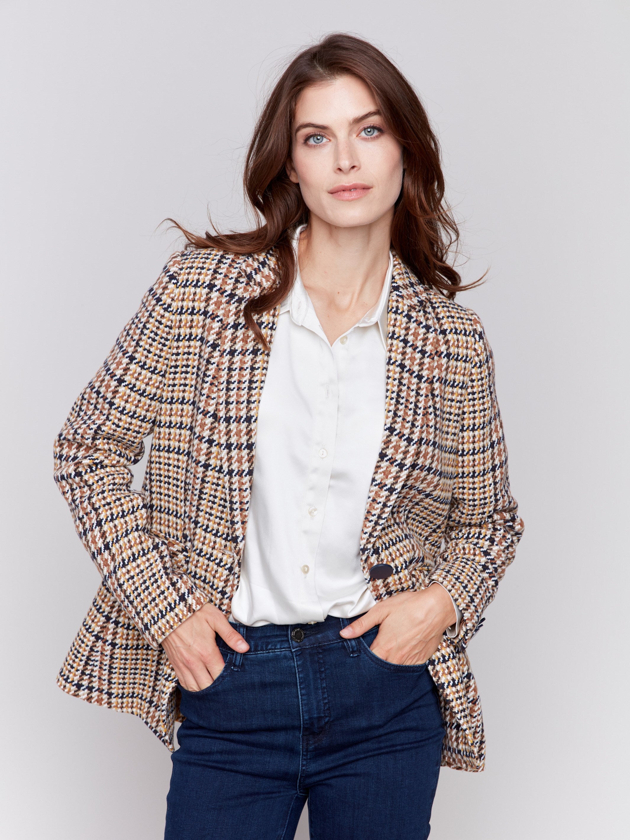 Terracotta plaid blazer with a single-button closure, featuring two front flap pockets by Charlie B.