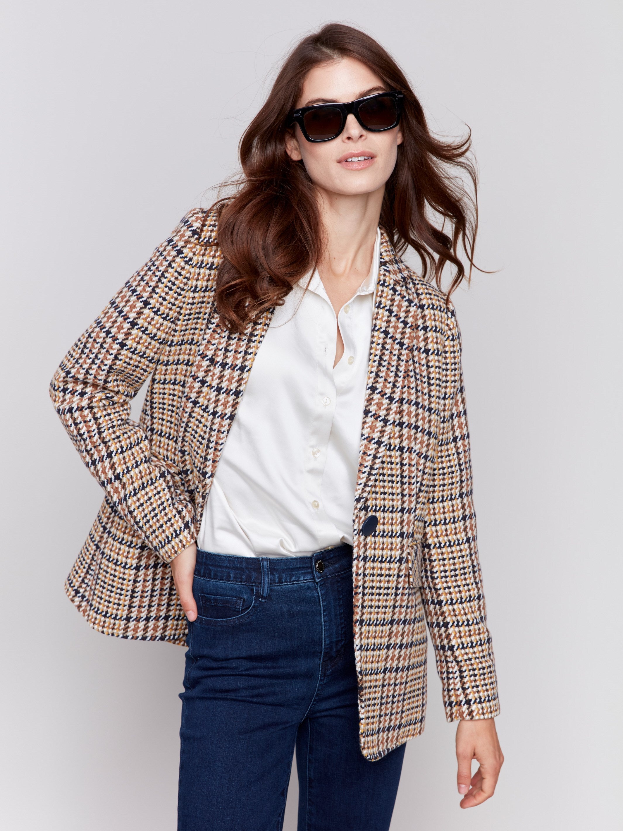 Terracotta plaid blazer with a single-button closure, featuring two front flap pockets by Charlie B.