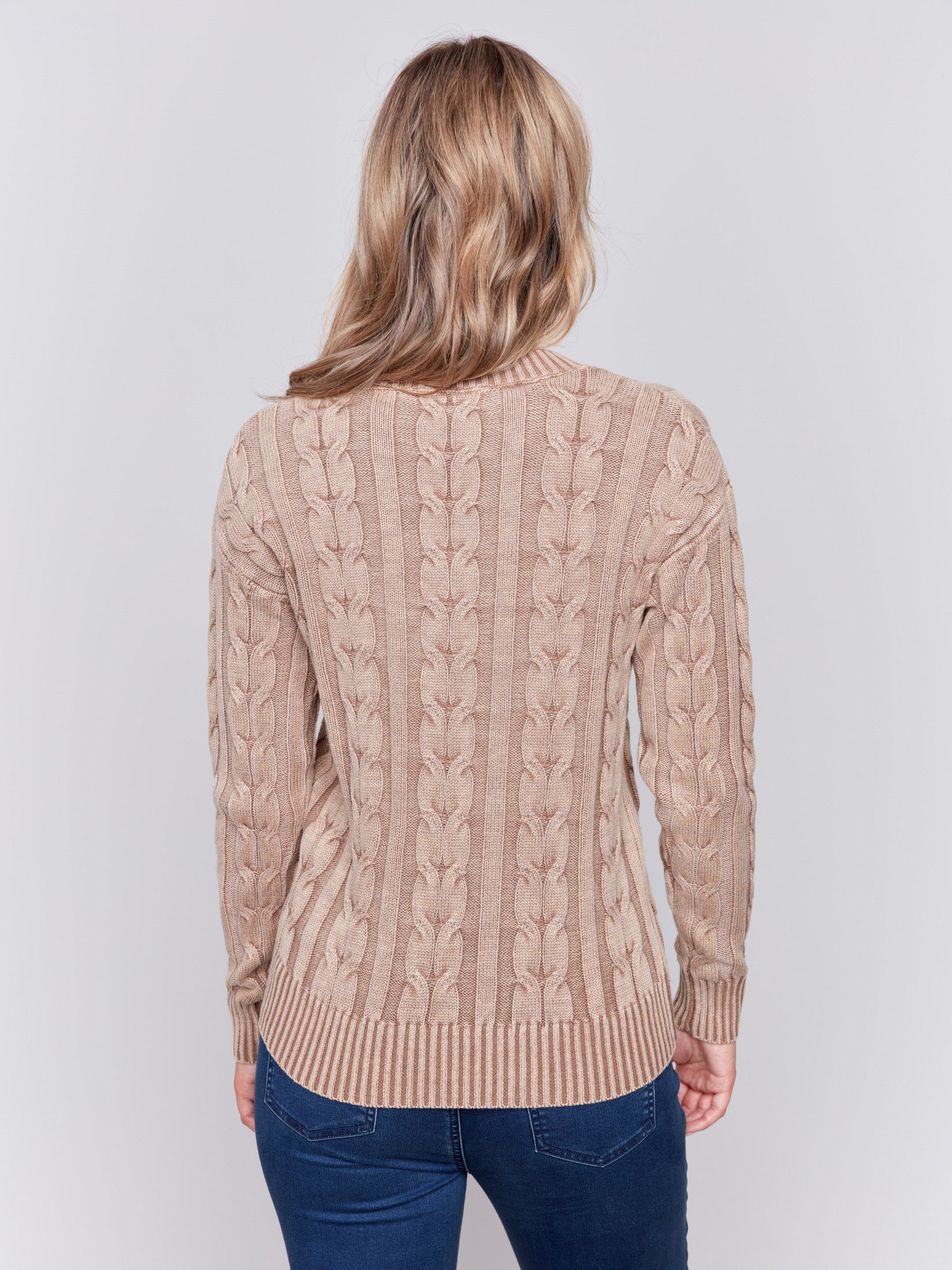 Truffle brown cable knit sweater with a V-neckline, long sleeves, and geometric patterns by Charlie B.