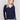 Navy V-neck fooler sweater with chambray shirt collar and peeking details at the hem and cuffs by Charlie B.