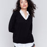 Black V-neck fooler sweater with white shirt collar, featuring a shirttail hem and side slits by Charlie B.