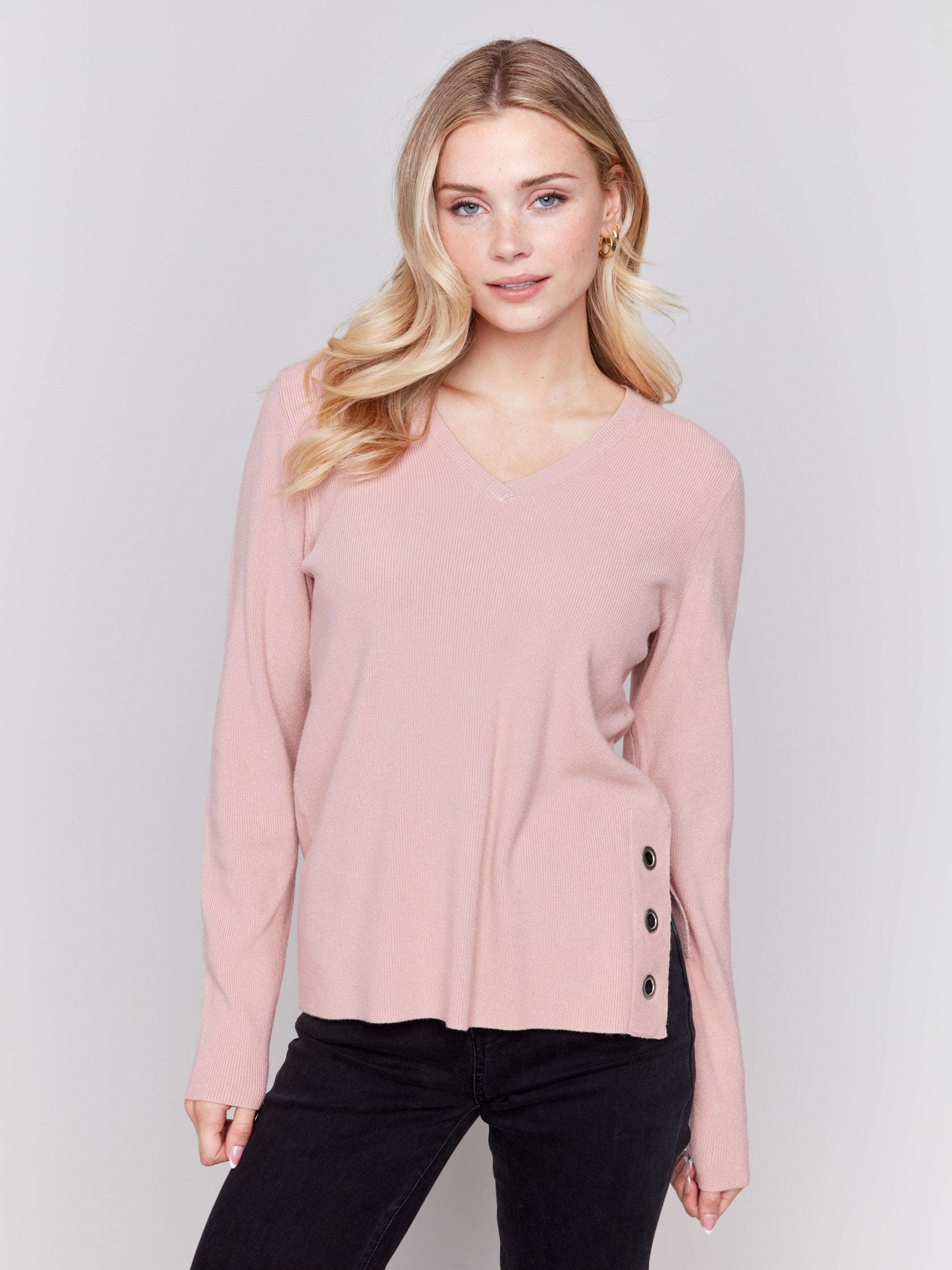 Heather woodrose V-neck sweater with long sleeves featuring grommet details at the side placket by Charlie B.