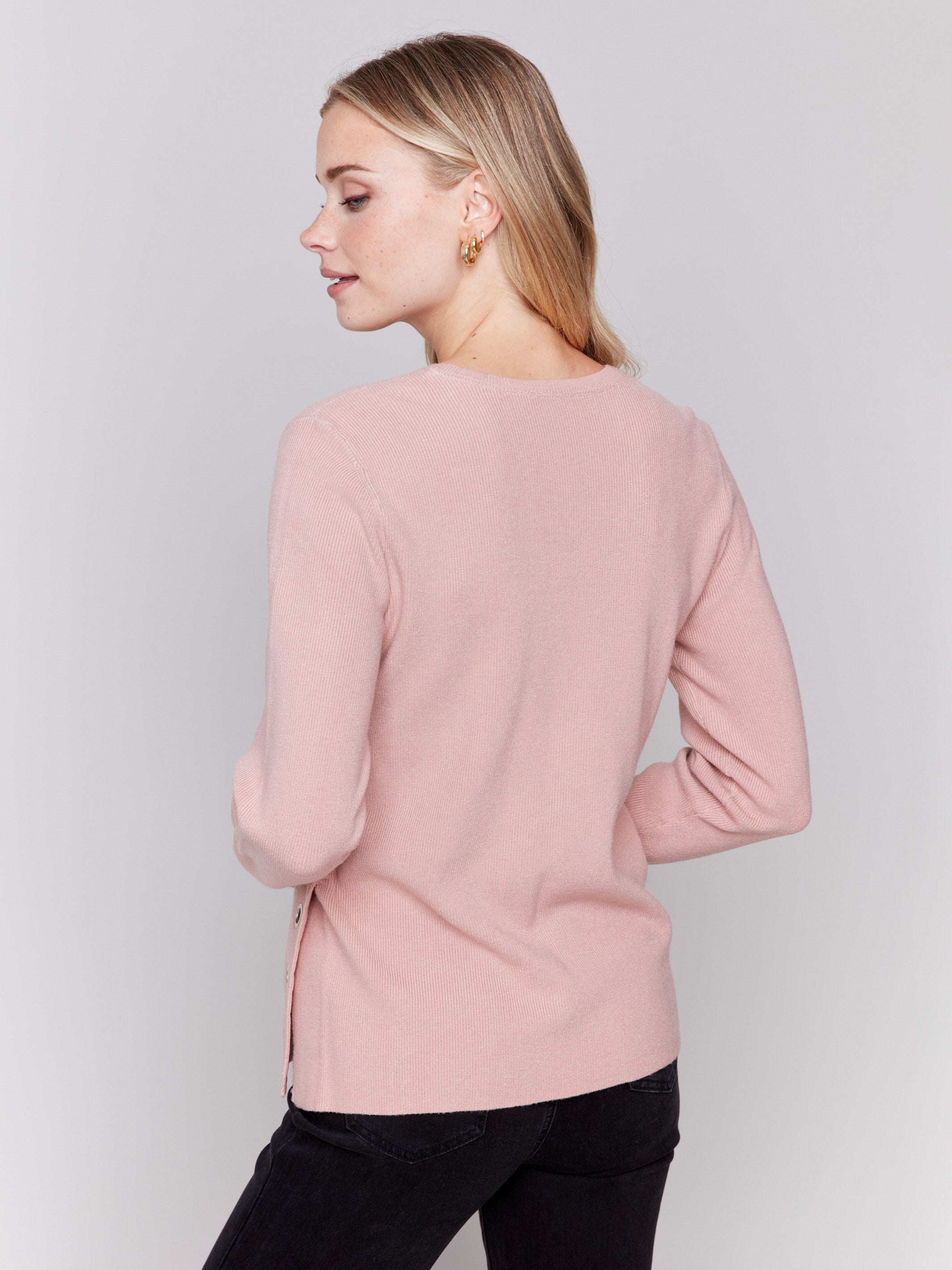 Heather woodrose V-neck sweater with long sleeves featuring grommet details at the side placket by Charlie B.