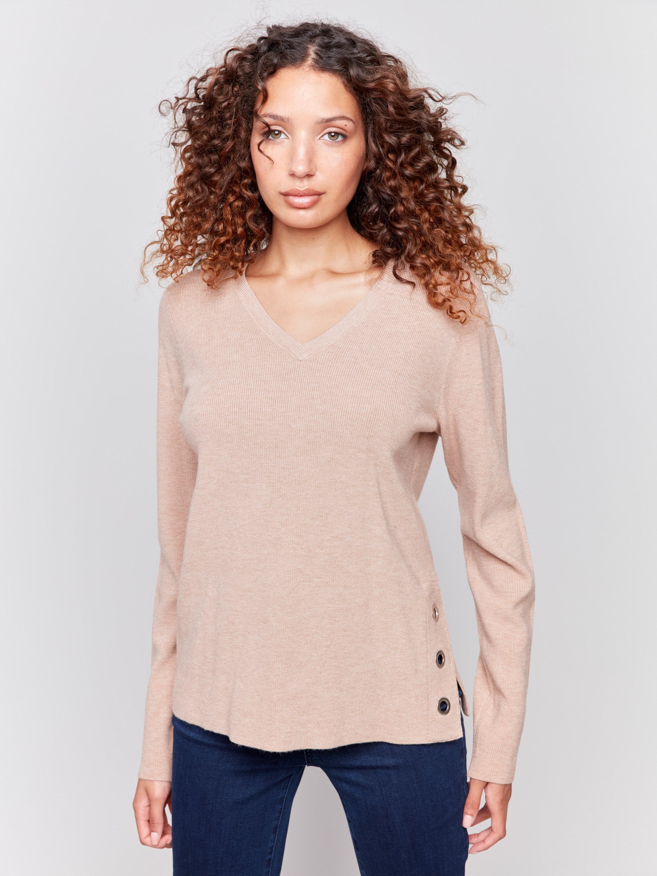 Heather truffle V-neck sweater with long sleeves featuring grommet details at the side placket by Charlie B.