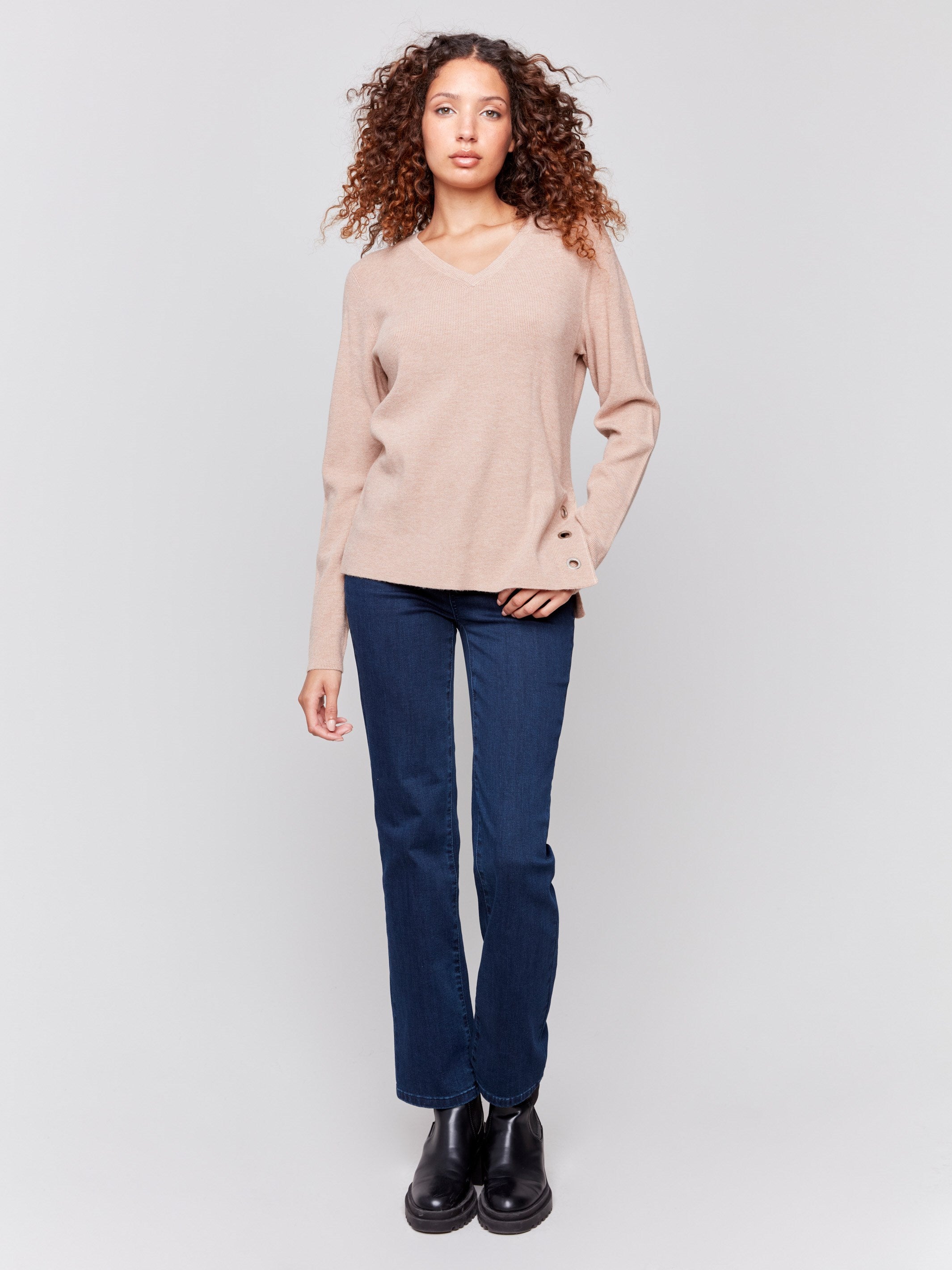 Heather truffle V-neck sweater with long sleeves featuring grommet details at the side placket by Charlie B.