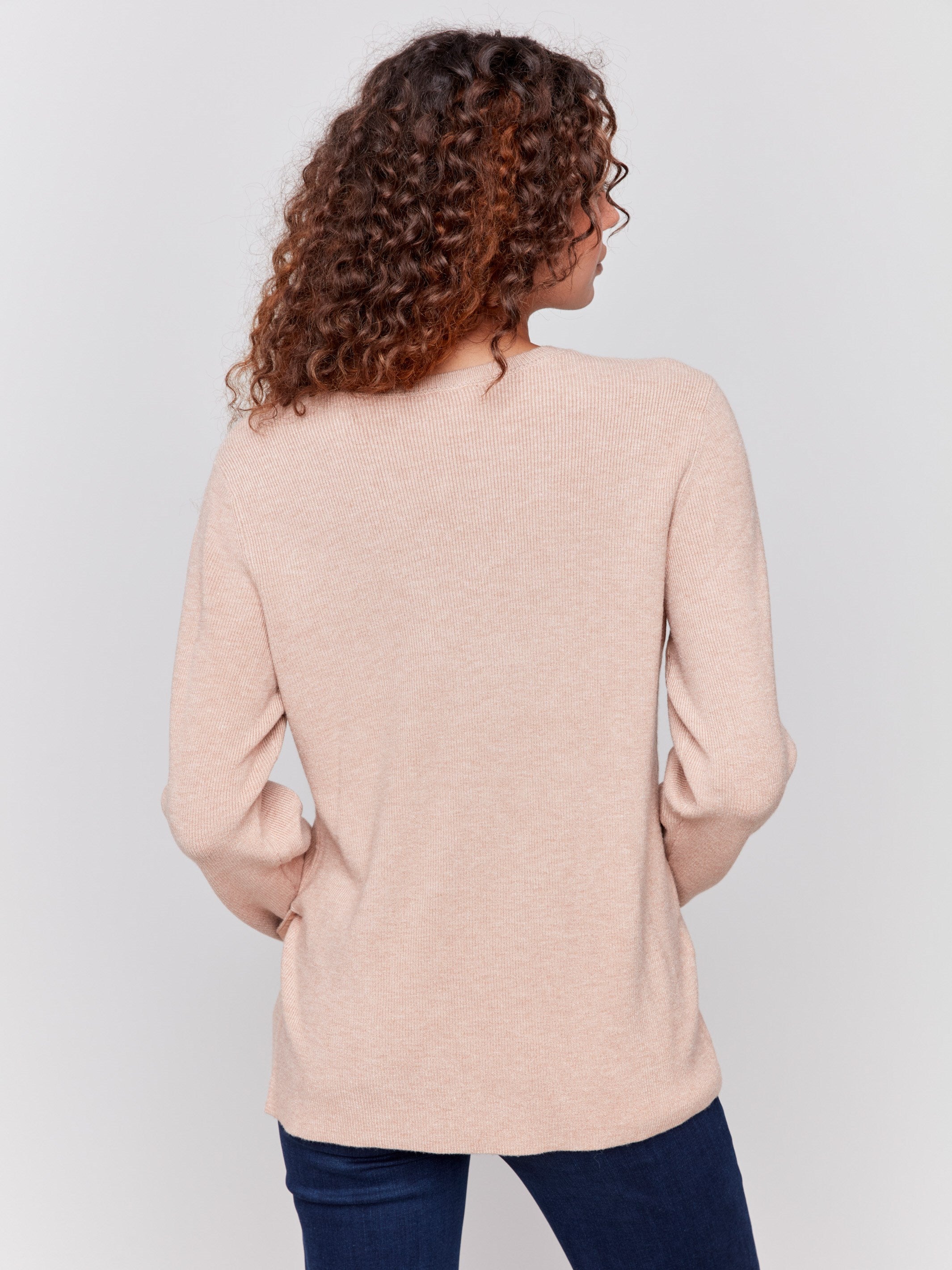 Heather truffle V-neck sweater with long sleeves featuring grommet details at the side placket by Charlie B.