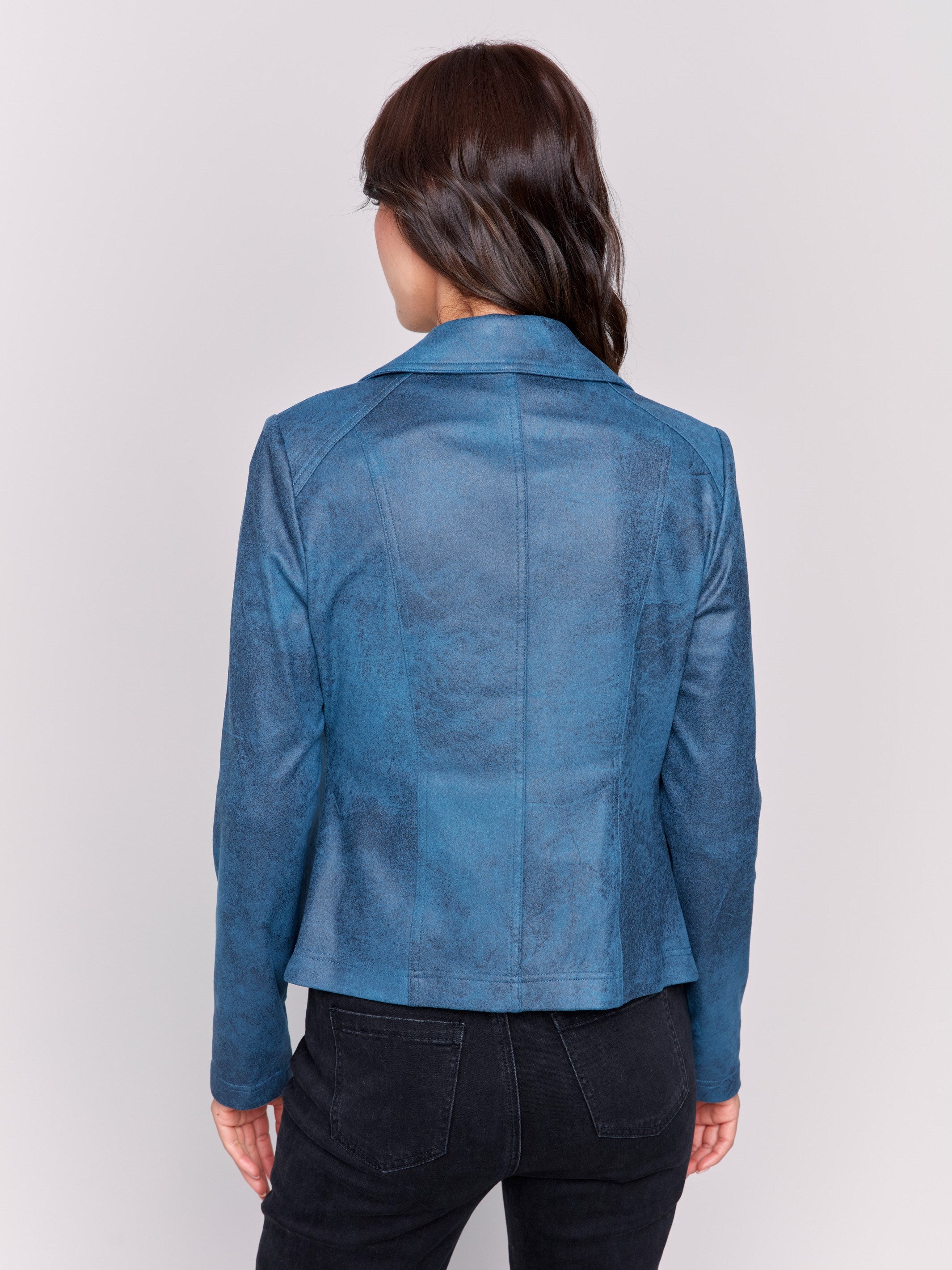 Peacock blue faux leather biker jacket with zipper details and fake pockets by Charlie B.