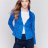 Sapphire blue faux suede jacket with silver zipper details, featuring a lapel collar and a fitted silhouette by Charlie B.